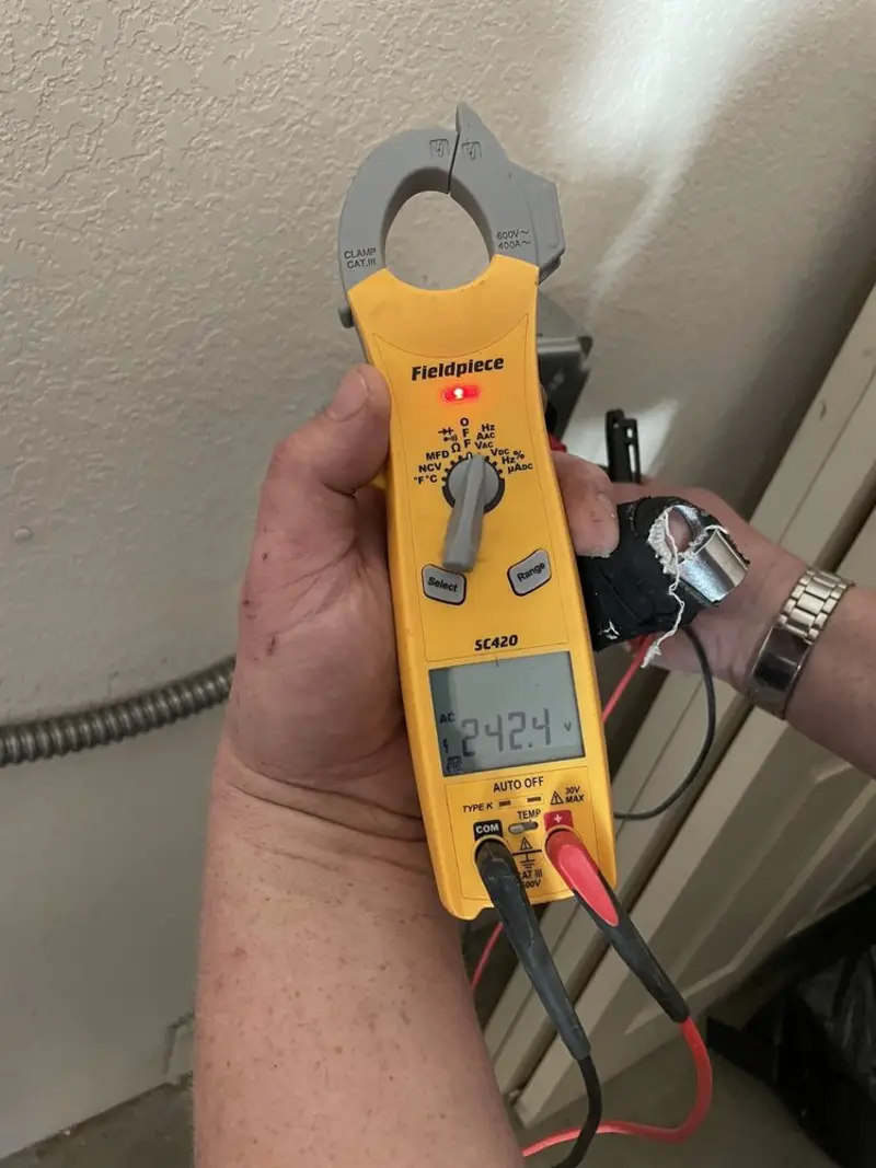 Voltage testing with clamp meter during Generator Installation in Hobe Sound